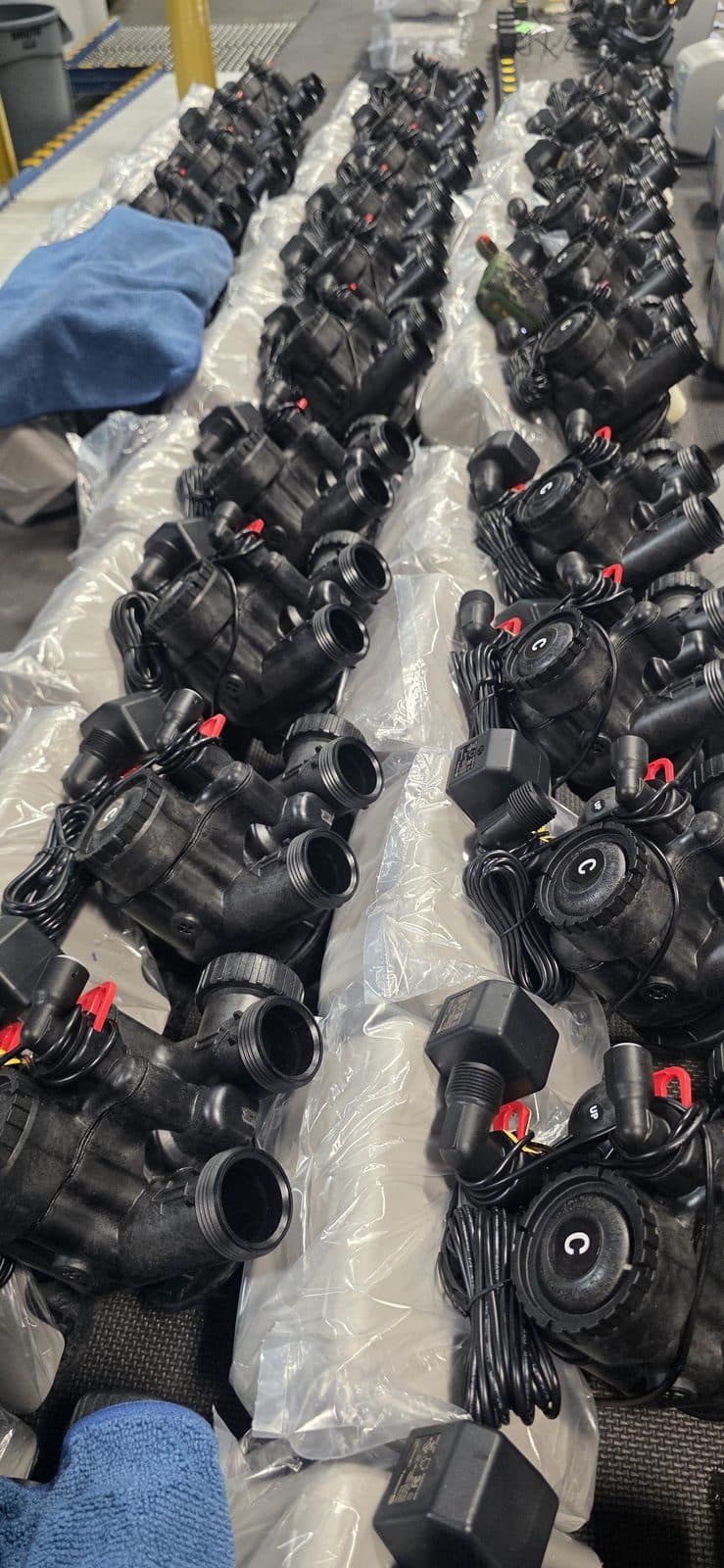 Rows of metered control valves with power supplies staged on the Aquonyx assembly line